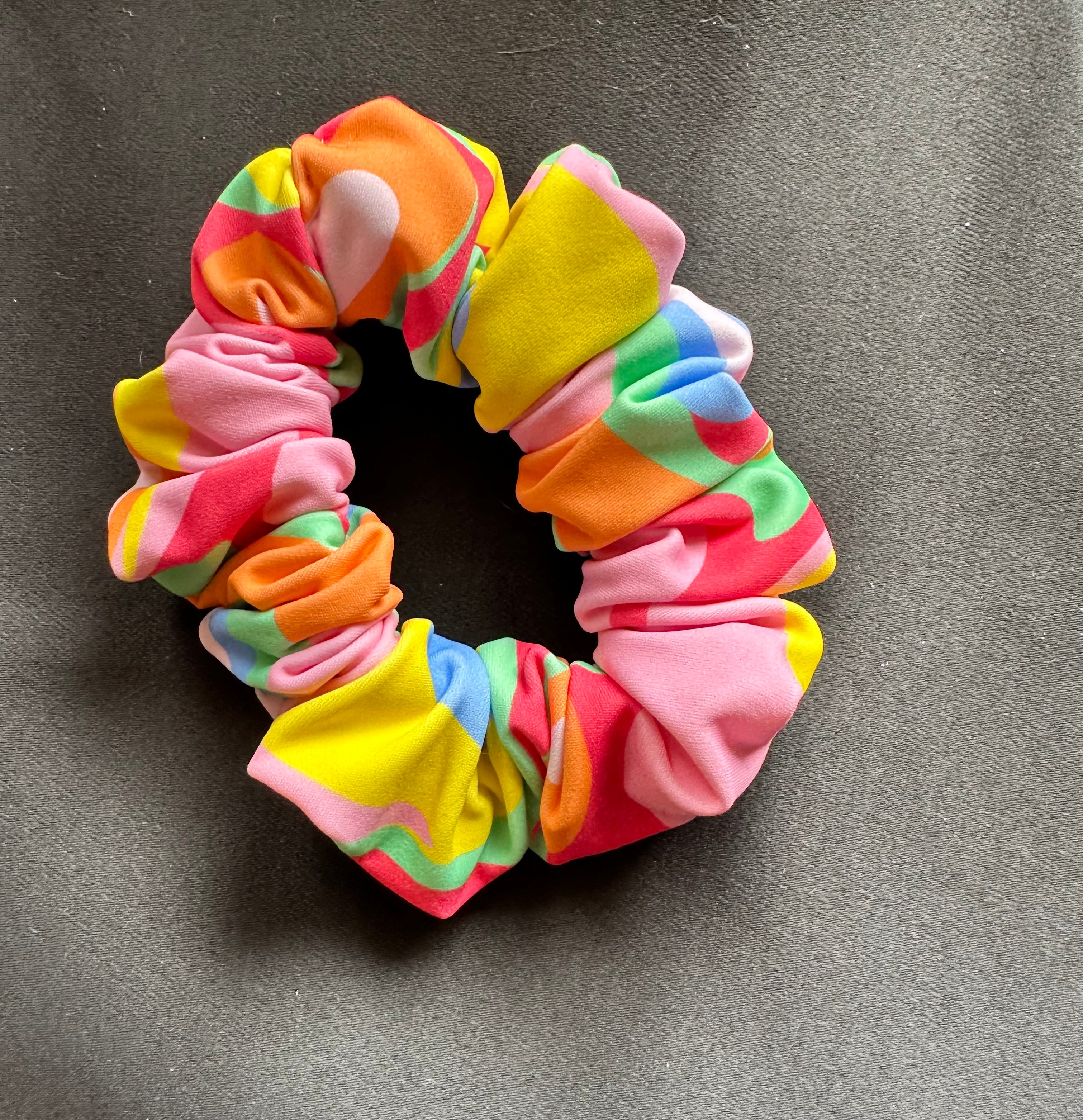 Multicolored scrunchie on a gray background